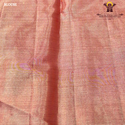 A beautiful peach gold shade blended with a soft pink undertone Saree