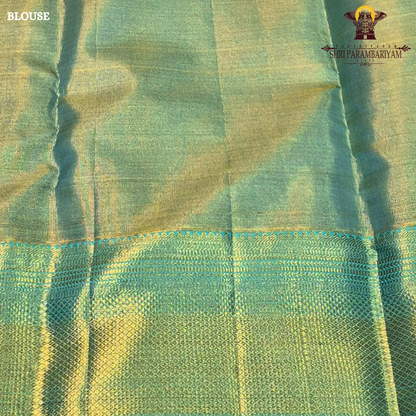A refreshing sea green shade beautifully blended with rich gold tissue Saree