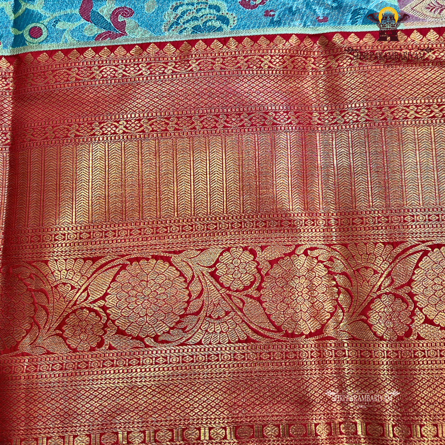 A graceful steel blue / teal blue Saree