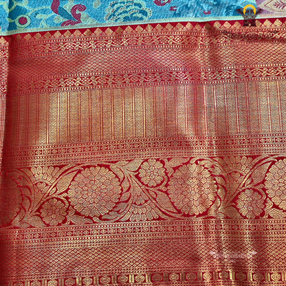 A graceful steel blue / teal blue Saree