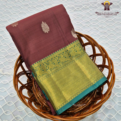 Rich maroon body adorned with elegant traditional gold zari Saree
