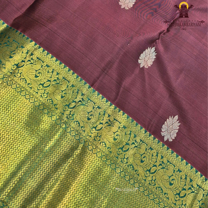 Rich maroon body adorned with elegant traditional gold zari Saree