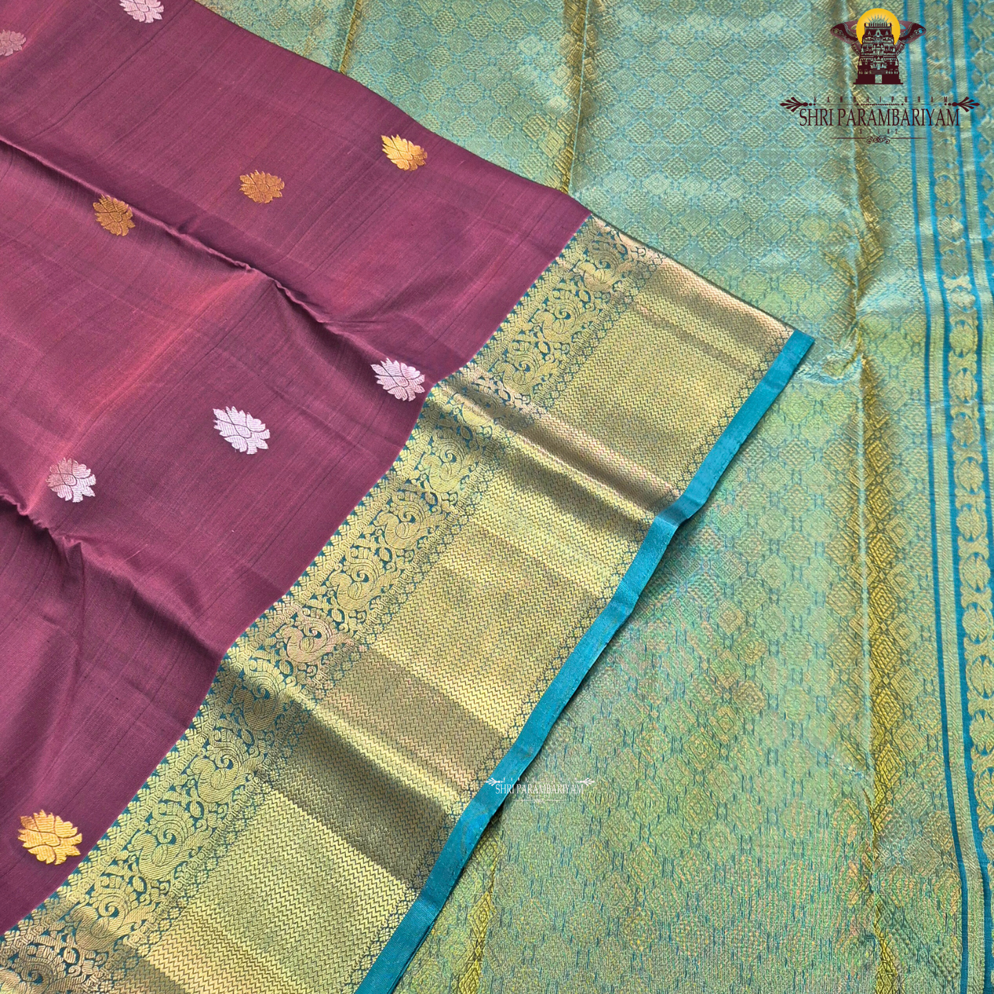 Rich maroon body adorned with elegant traditional gold zari Saree
