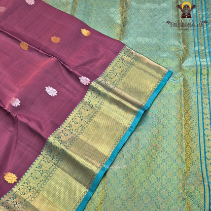 Rich maroon body adorned with elegant traditional gold zari Saree