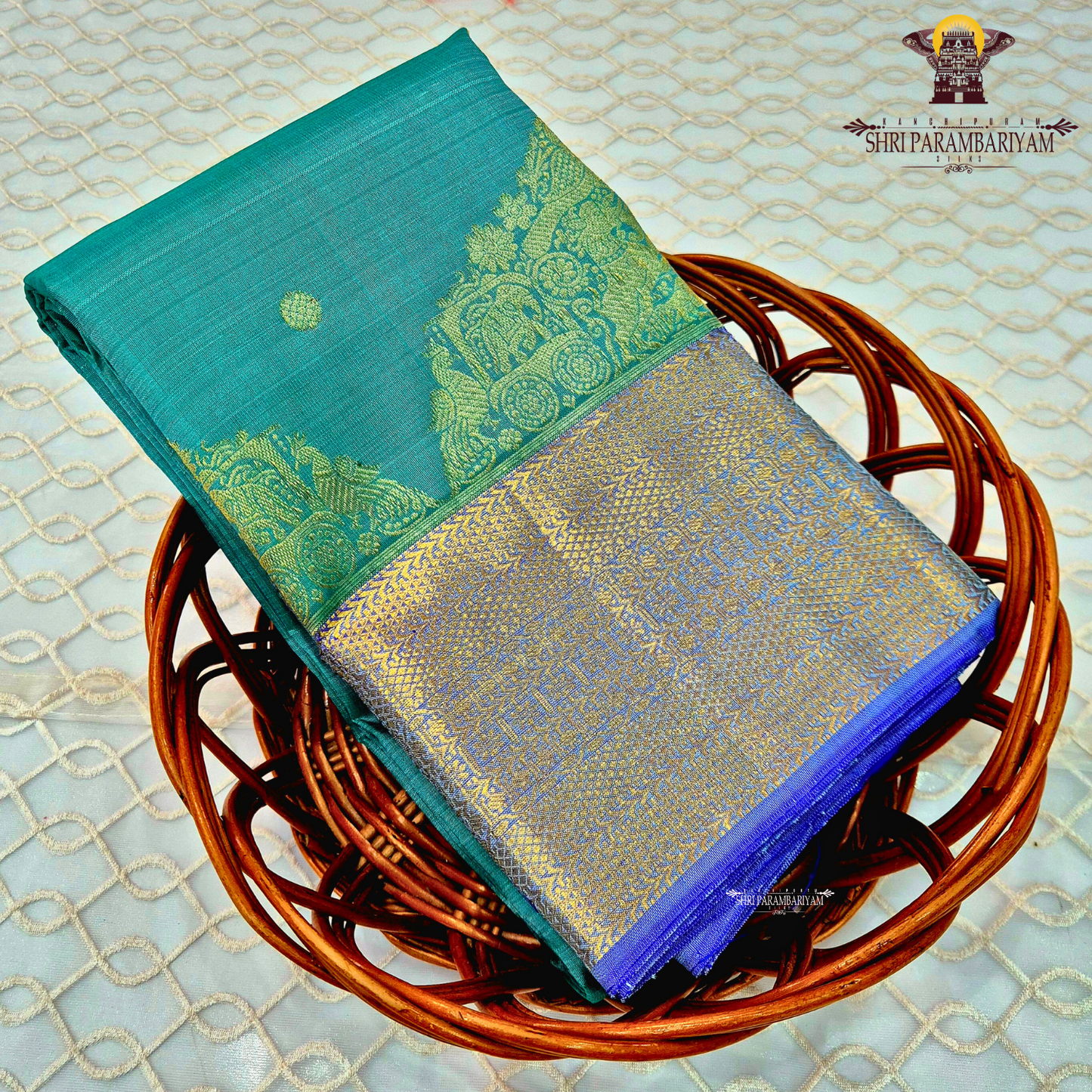 Elegant teal green (peacock green tone) body with a contrasting Saree