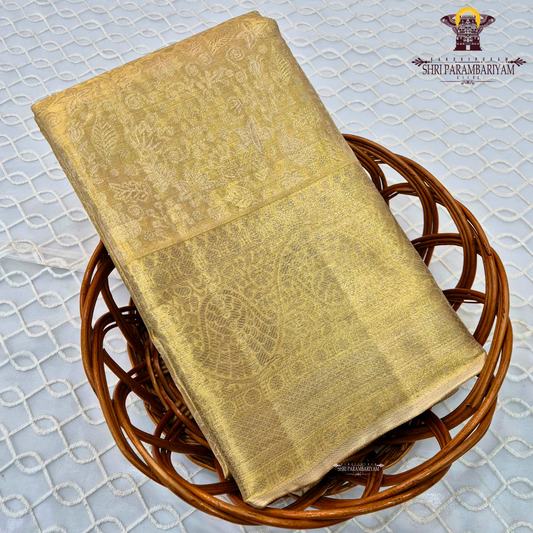 A luxurious antique golden hue that gives a radiant and regal Saree