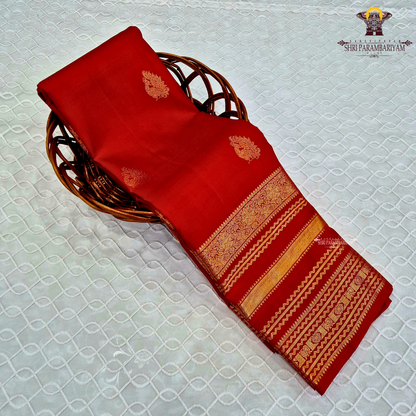 A classic Vermilion Red / Arakku Red with a radiant silk Saree