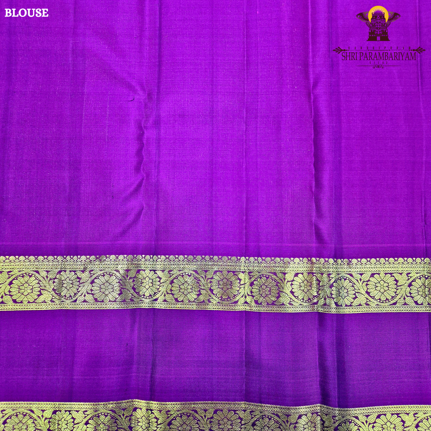 A rich deep violet / royal purple body paired with contrast magenta (pink) and antique gold tones Saree