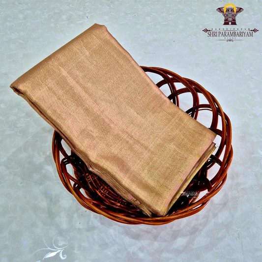 A beautiful champagne gold shade that gives a subtle and luxurious shimmer Saree