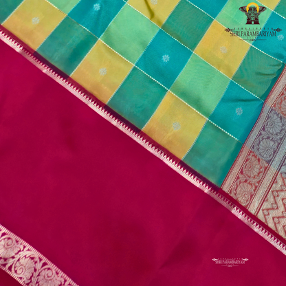 Teal green with mustard-gold checked pattern Saree