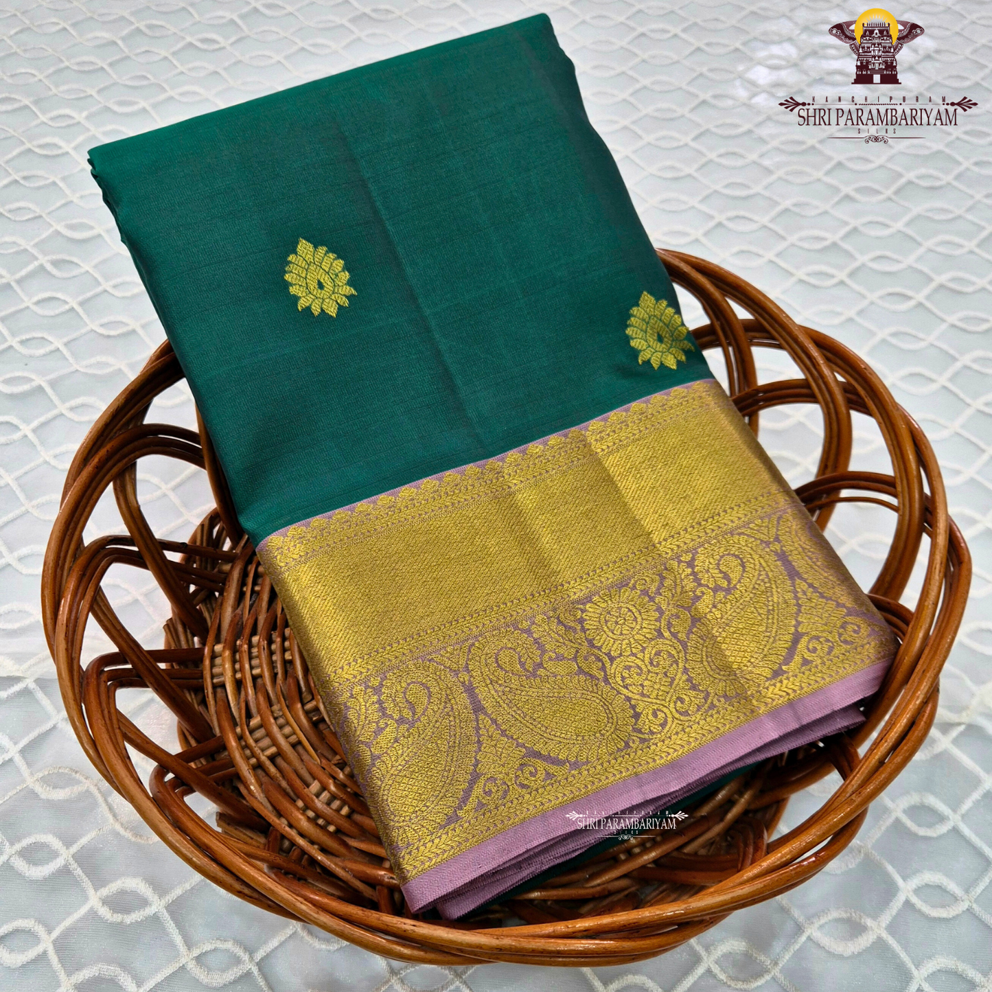 Rich peacock green / deep teal green body with gold zari buttas Saree