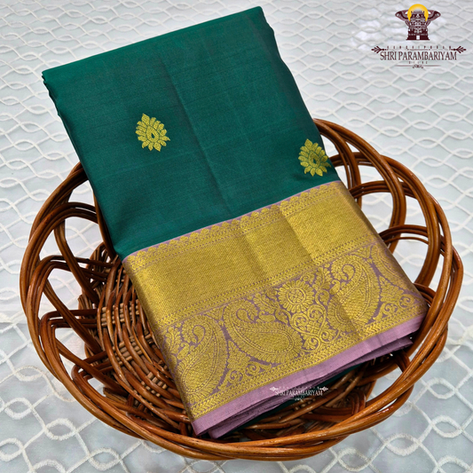 Rich peacock green / deep teal green body with gold zari buttas Saree
