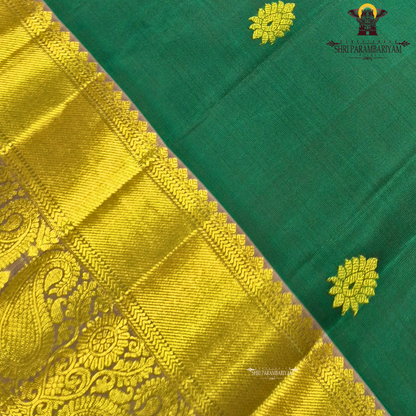 Rich peacock green / deep teal green body with gold zari buttas Saree