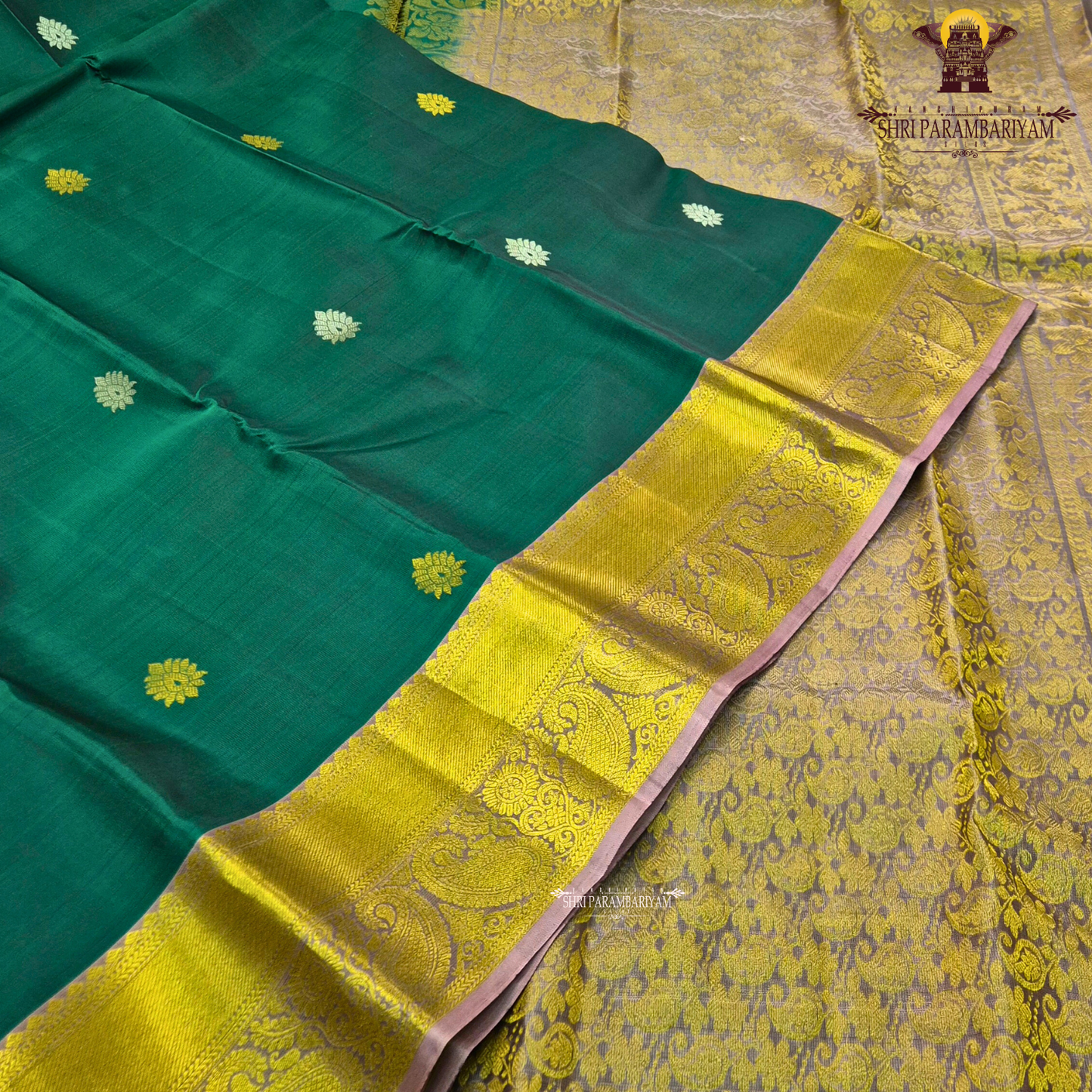 Rich peacock green / deep teal green body with gold zari buttas Saree