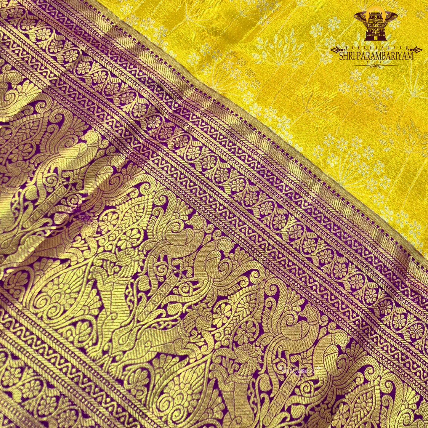 A vibrant sunshine yellow body paired with a rich royal purple border Saree