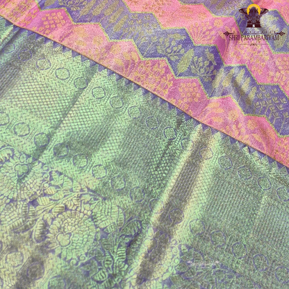 A graceful blend of lavender purple and soft silver tissue base Saree