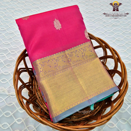 Vibrant rani pink / bright magenta body with gold zari buttas Saree
