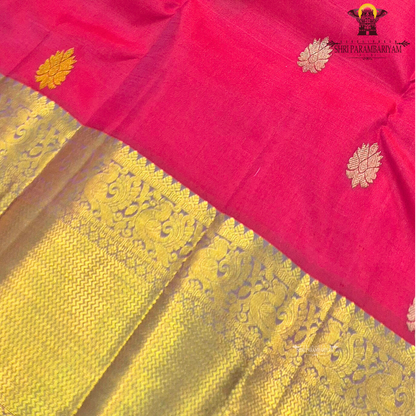 Vibrant rani pink / bright magenta body with gold zari buttas Saree