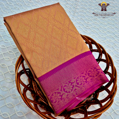 Warm copper brown / light coffee brown with golden undertone Saree