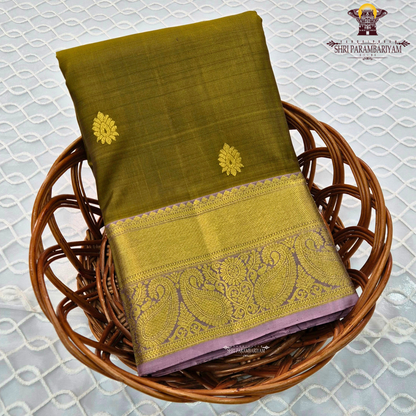 Elegant olive green / moss green body with gold zari buttas Saree