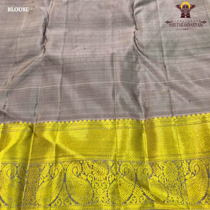 Elegant olive green / moss green body with gold zari buttas Saree