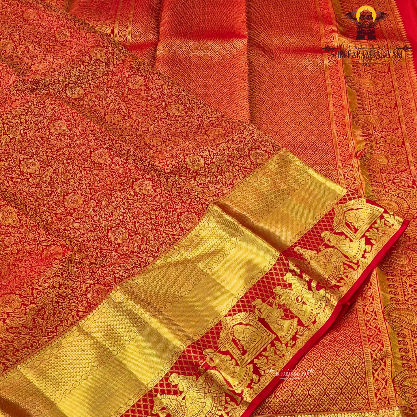 Rich bridal red with gold zari work Saree