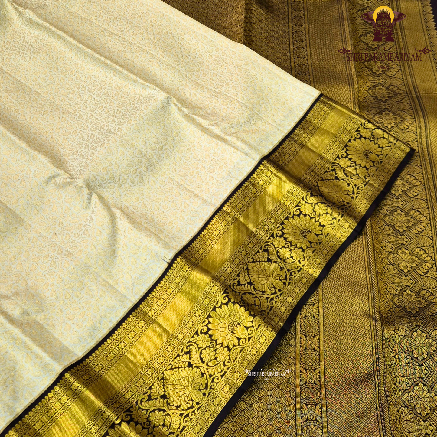Elegant half white / off-white (ivory tone) with deep coffee brown contrast Saree