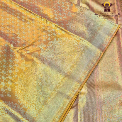 A rich mustard gold (honey gold) shade, radiating a warm and luxurious glow Saree