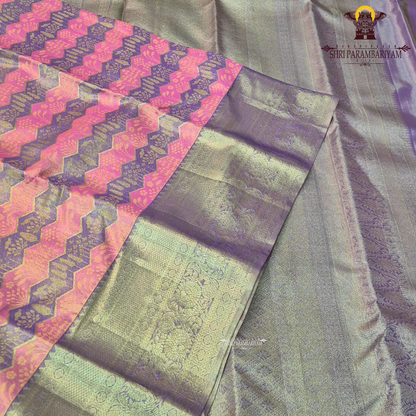 A graceful blend of lavender purple and soft silver tissue base Saree