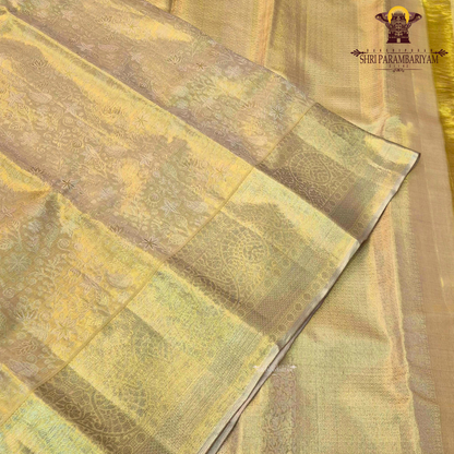 A luxurious antique golden hue that gives a radiant and regal Saree