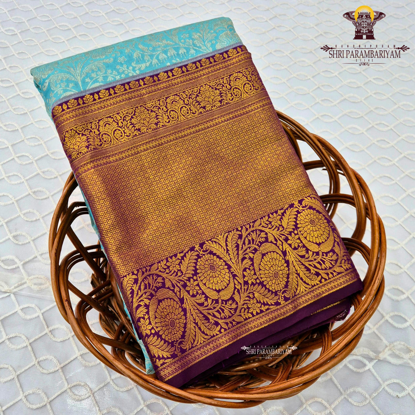 Elegant turquoise blue with Rich royal purple (violet) border Saree