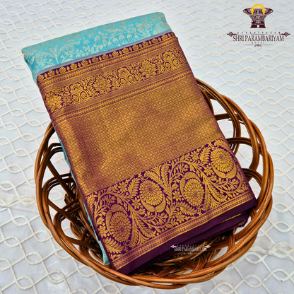Elegant turquoise blue with Rich royal purple (violet) border Saree