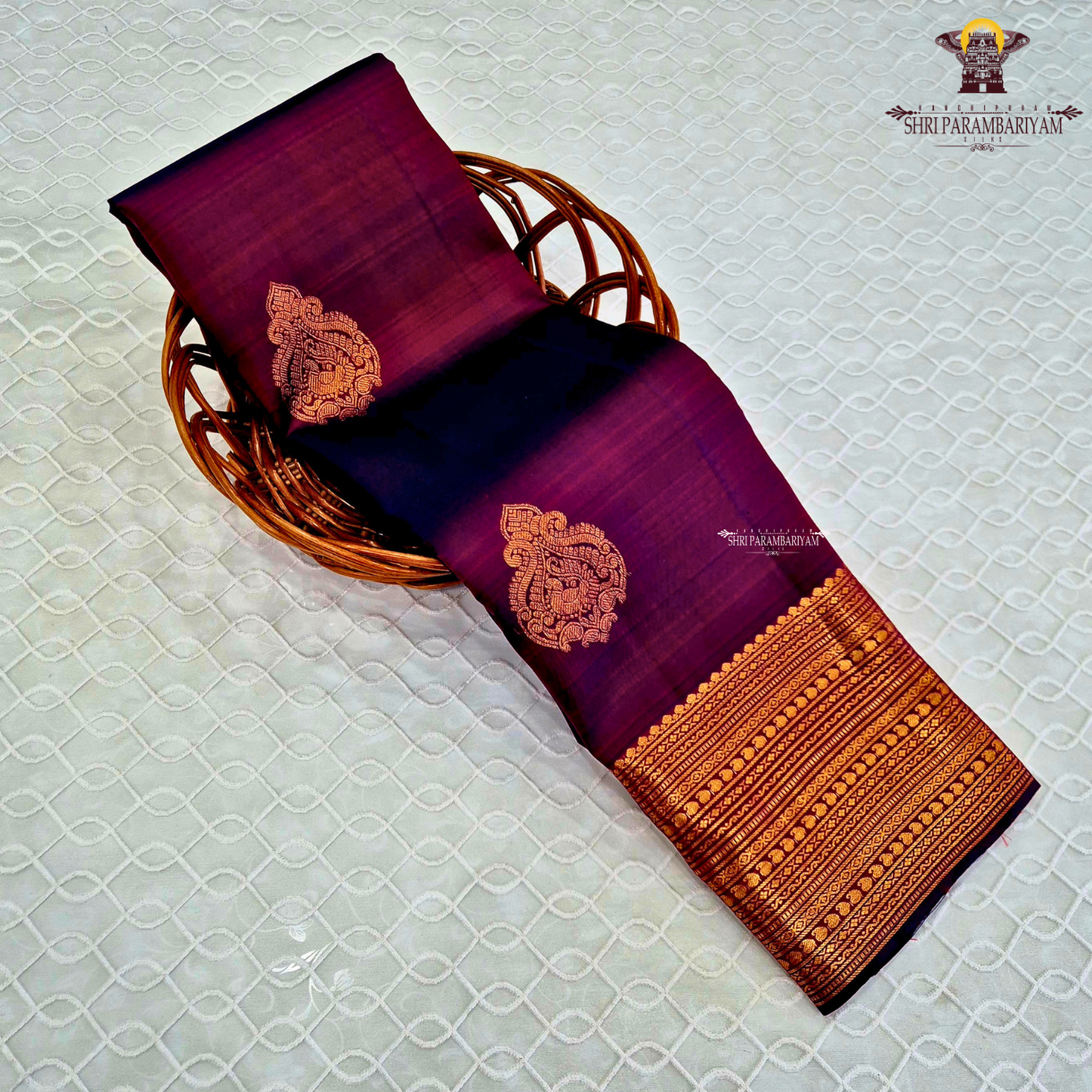 A deep Magenta Purple / Rani Purple with a rich dual-tone Saree