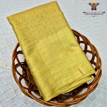 A rich golden yellow shade that beautifully reflects light Saree