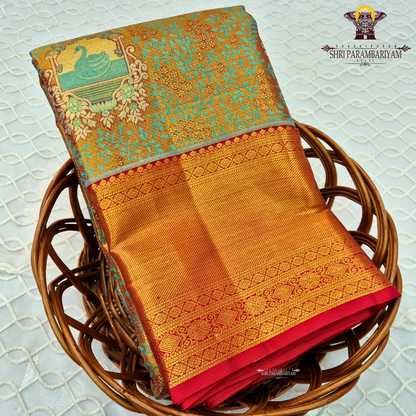 Rich dual-tone blend of antique gold and teal green Saree