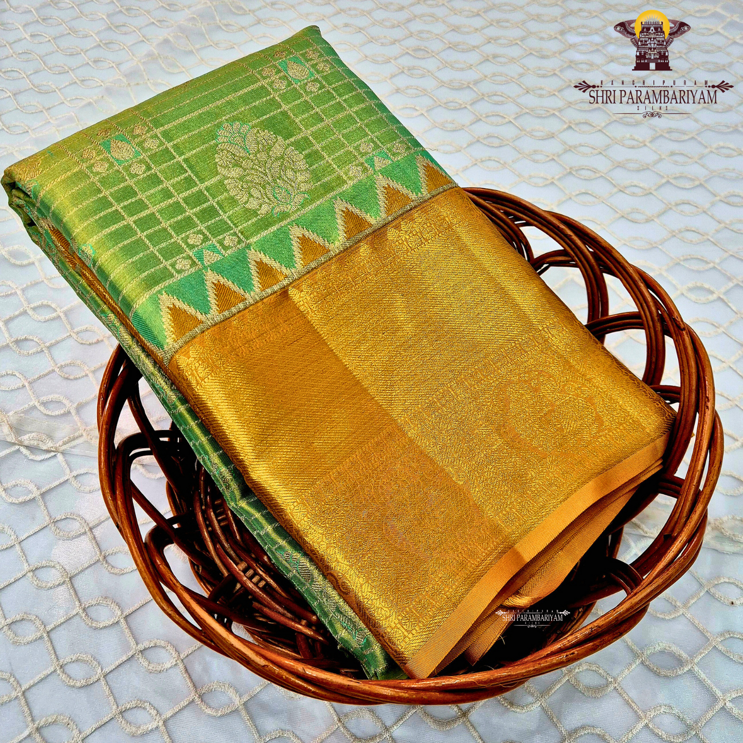 A fresh parrot green / leaf green with golden tissue sheen Saree