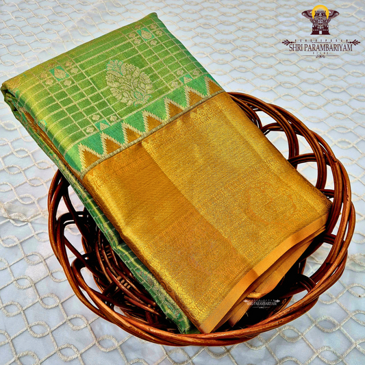 A fresh parrot green / leaf green with golden tissue sheen Saree
