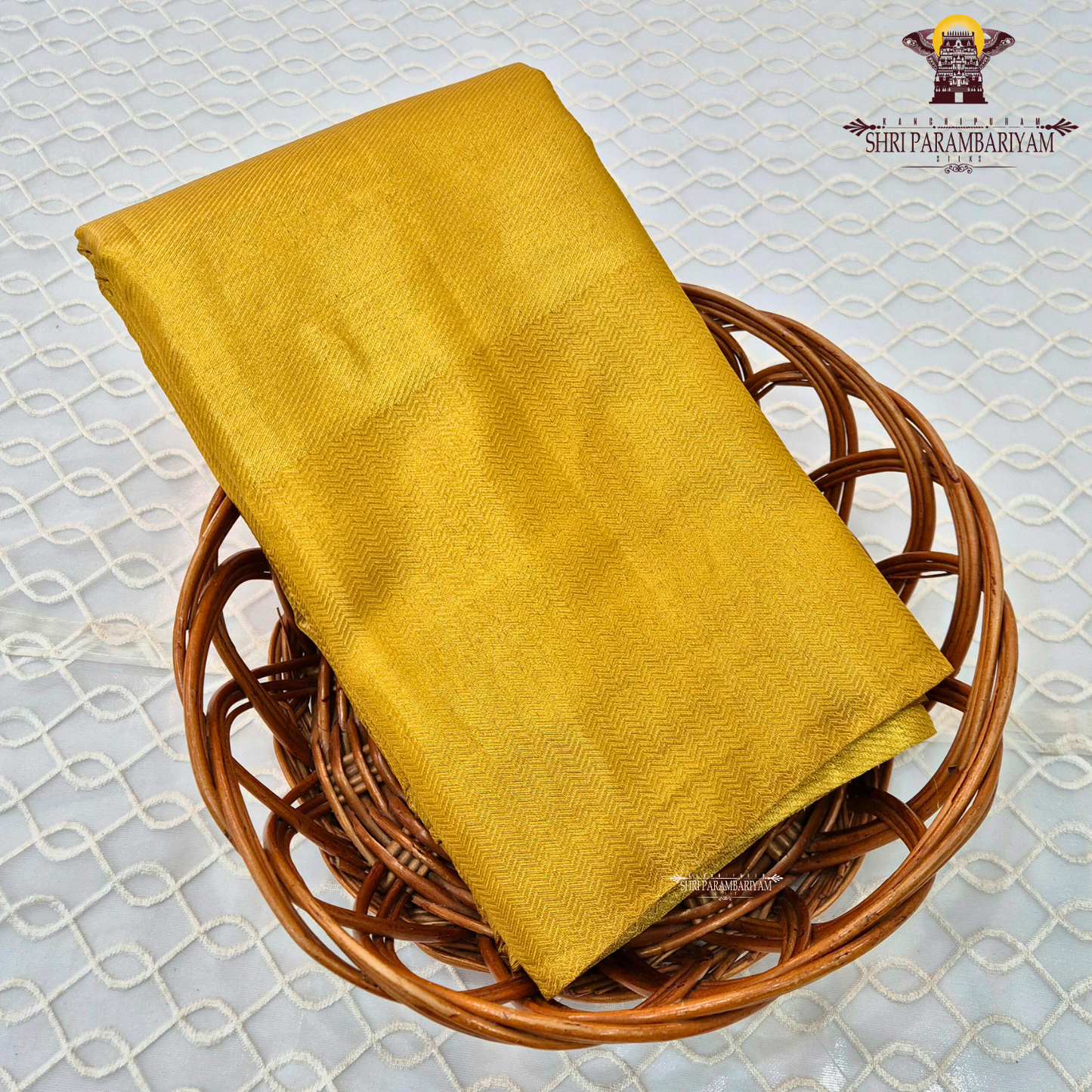 A rich mustard yellow (golden yellow) shade with a subtle shimmering Saree