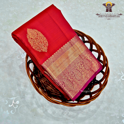 A rich and vibrant bright red with slight crimson undertones Saree