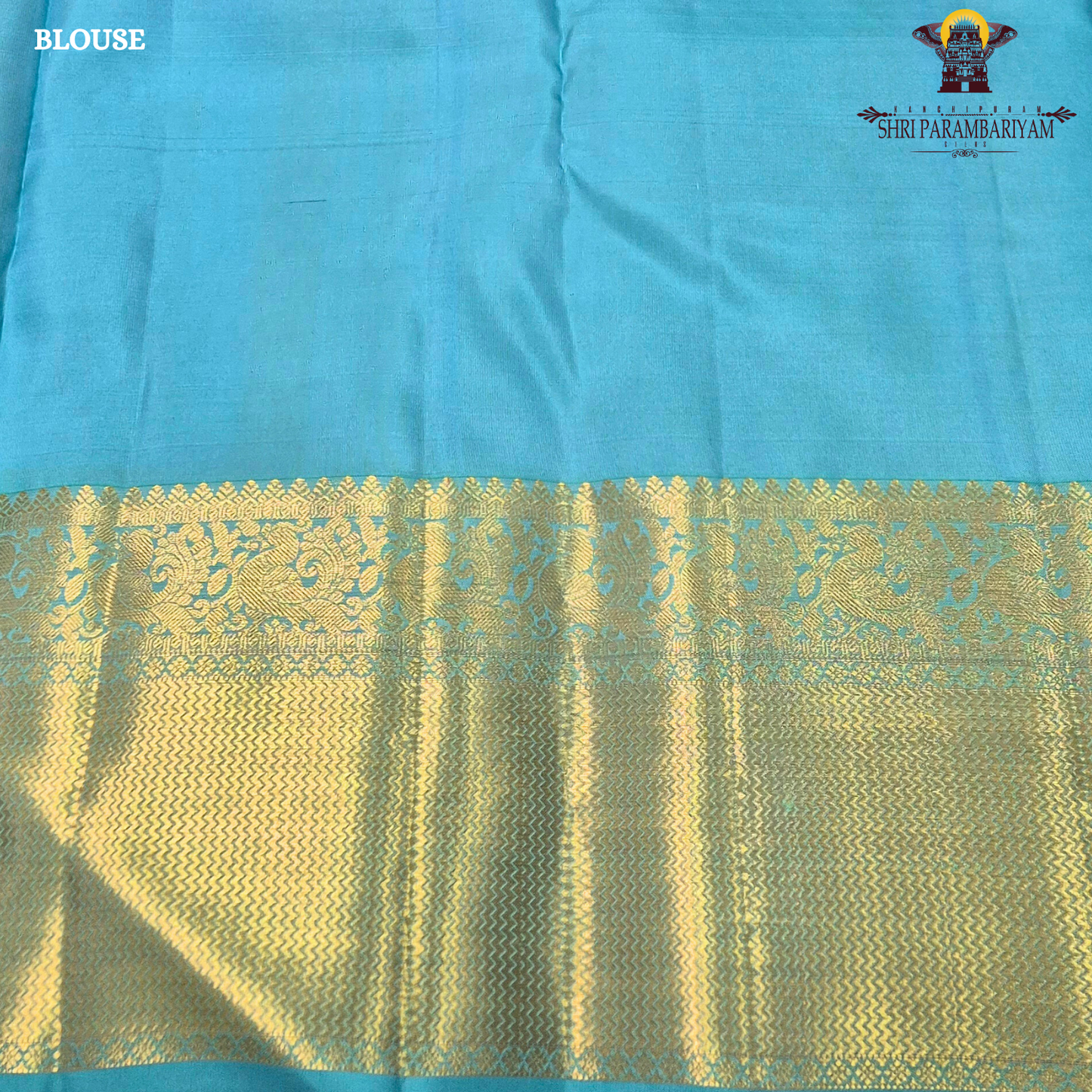 A vibrant rose pink body paired with a rich antique gold zari border Saree