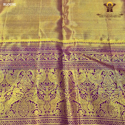 A vibrant sunshine yellow body paired with a rich royal purple border Saree