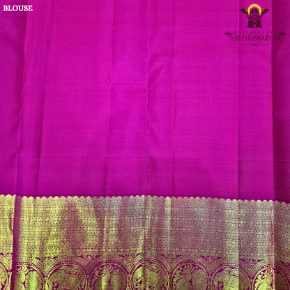 A deep rani pink (rich reddish-pink) Saree