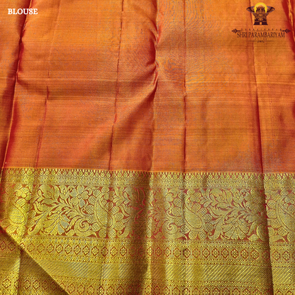 Bright rani pink (vibrant magenta tone) with a rich gold zari border and orange edging Saree