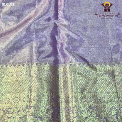 A graceful blend of lavender purple and soft silver tissue base Saree