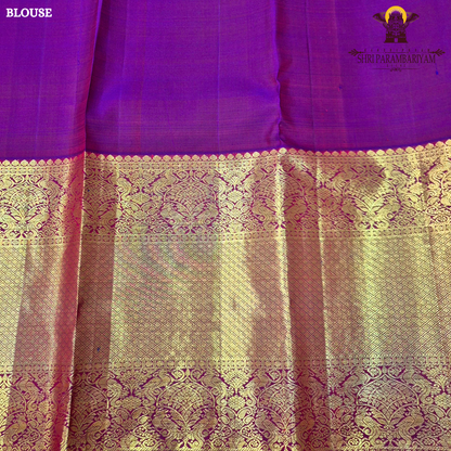 A mustard Yellow and Royal Purple with rich Gold Zari weaving Saree