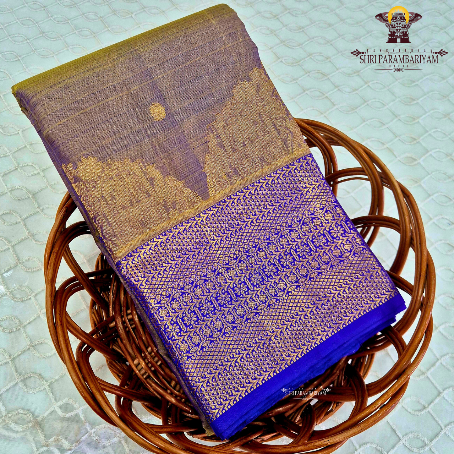A beautiful dual-tone shade of muted lavender with a golden mustard tint Saree