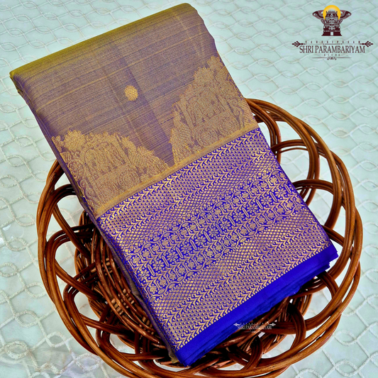 A beautiful dual-tone shade of muted lavender with a golden mustard tint Saree