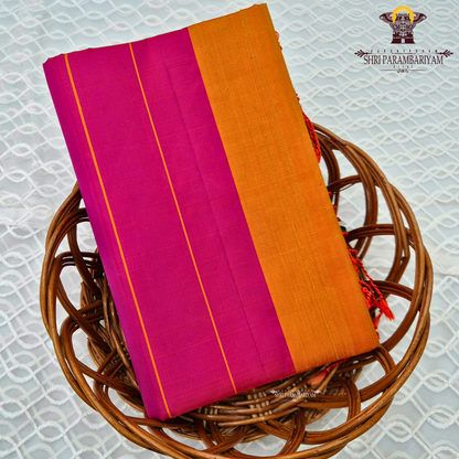 A striking dual-tone combination of vibrant rani pink and rich mustard orange Saree
