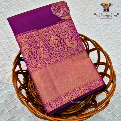 Vibrant magenta pink with rich gold zari and meenakari Saree