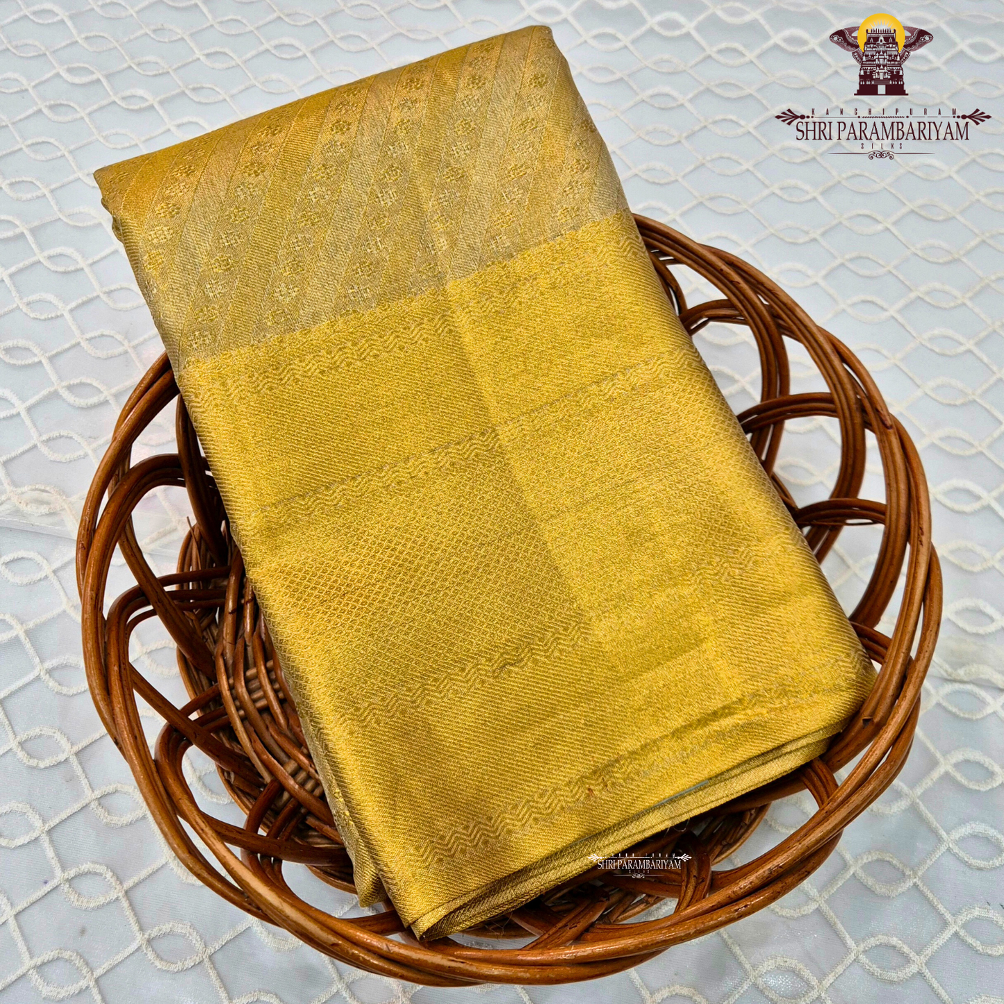 A rich bright golden shade that radiates a luxurious and traditional look Saree